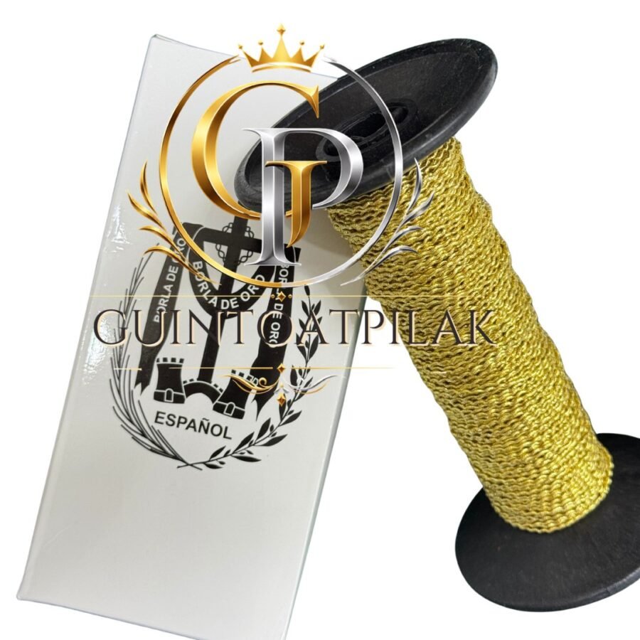 Metal corrugated thread gold spool leaning on the box