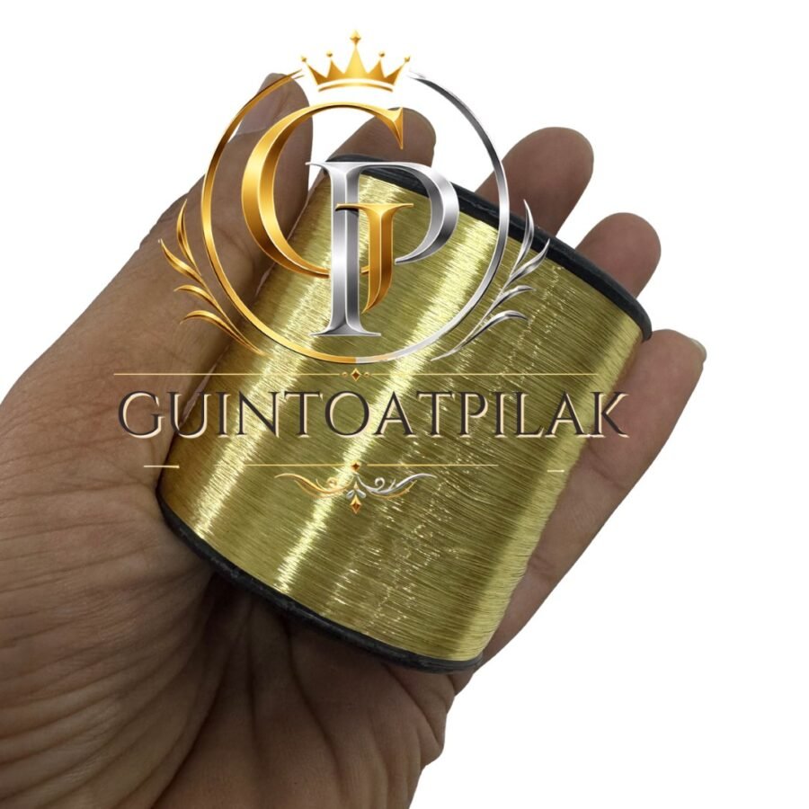 Fine Thread FMW Light Gold metallic thread spool in hand